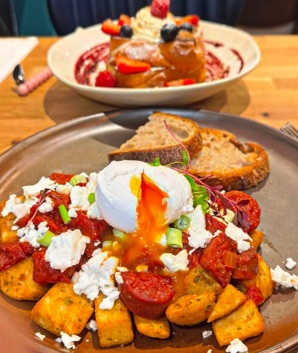 Chorizo and potato breakfast topped with an egg