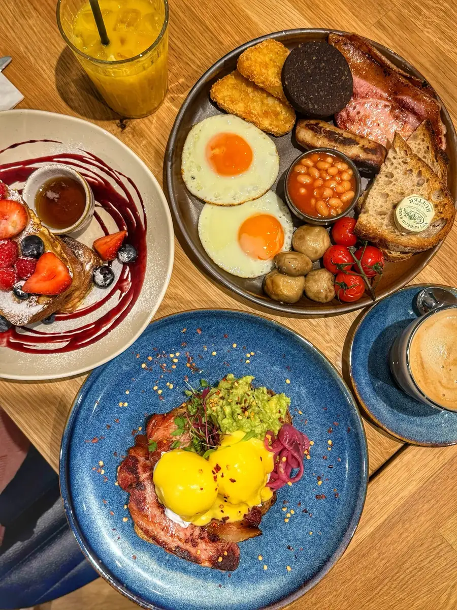 Breakfast and eggs dishes with coffee